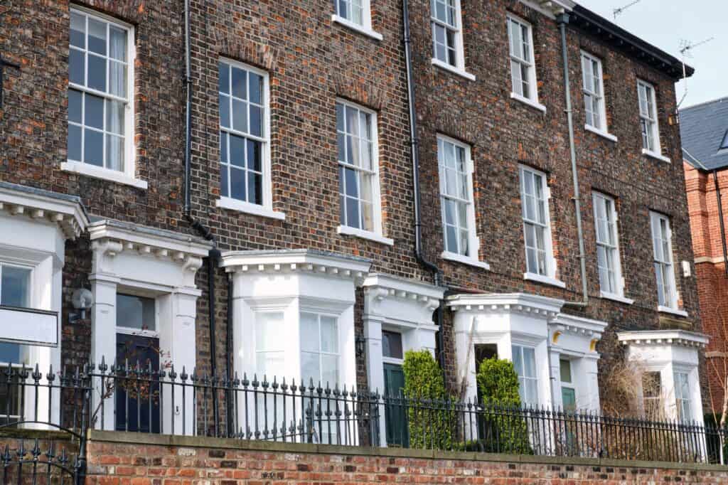 British detached house exterior in the concept of 'how to save money when moving to Islington'.